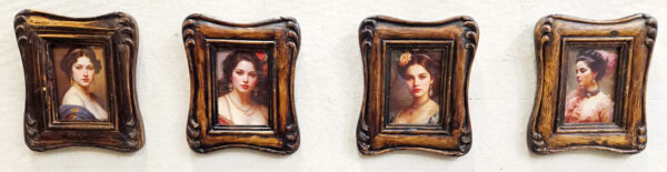 4 stampe con cornice intagliata