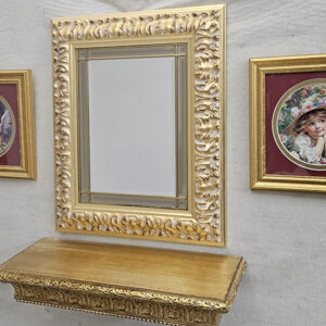 Specchio rilegato oro